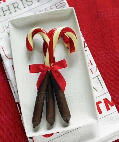 Candy canes dipped in chocolate Stock Photo Dissolve