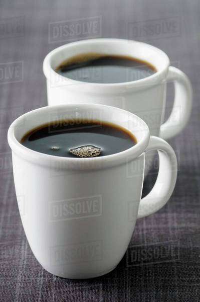 Two cups of black coffee - Royalty-free Stock Photo | Dissolve