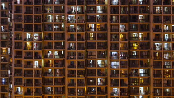 Timelapse Of Apartment Windows At Dusk To Night Stock Video Timelapse Of Apartment Windows At Dusk To Night Stock Video Footage Dissolve