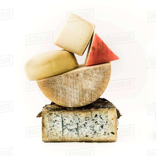 Pile of variety of cheeses Stock Photo Dissolve