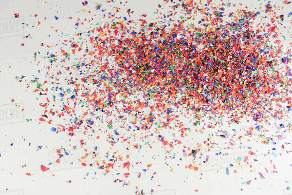 Confetti on white floor - Stock Photo - Dissolve