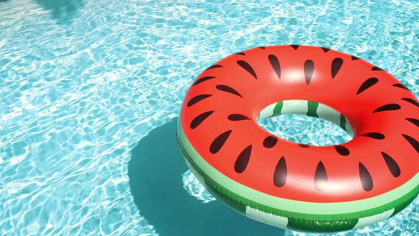 floating in swimming pool 