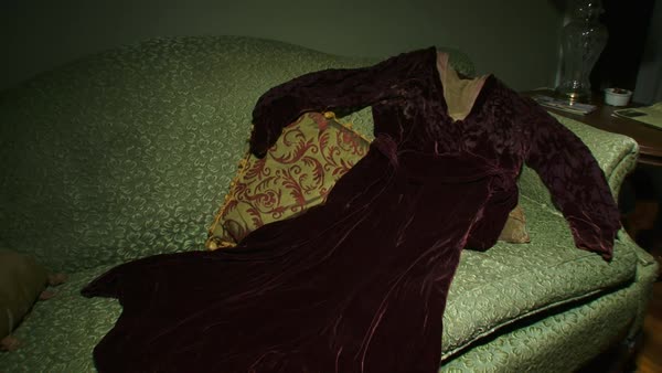 Velvet Red Dress Laid On A Couch Stock Video Footage Dissolve
