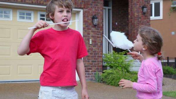 Little Girl Eats Cotton Candy And Her Brother Wants It Too But He