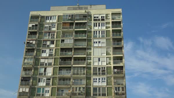 Elishing Shot Of An Old Rundown High Rise Apartment Building Elishing Shot Of An Old Rundown High Rise Apartment Building Stock Video Footage Dissolve