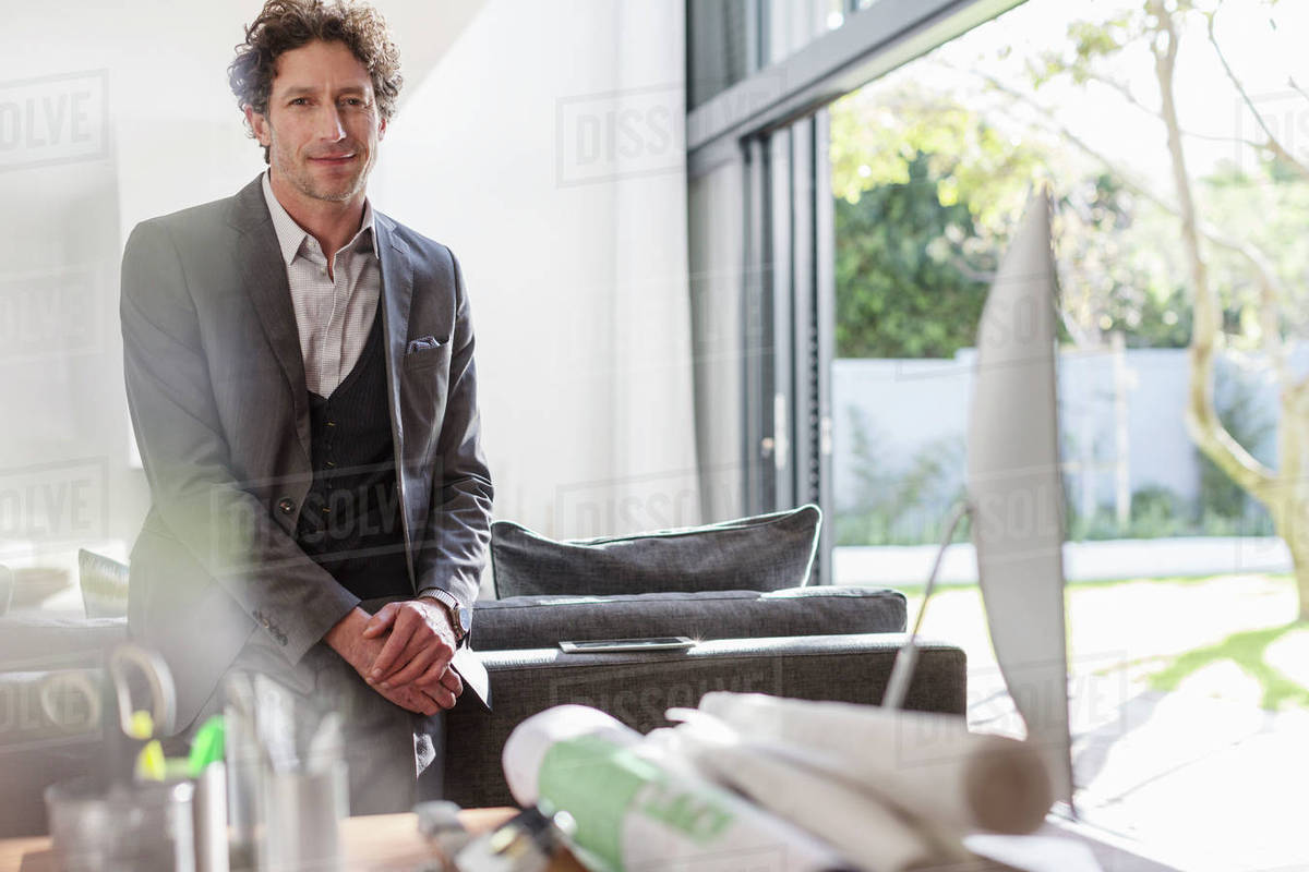 architect home office living room portrait confident male architect in home office stock photo architect home office living room portrait confident male architect in home office stock photo
