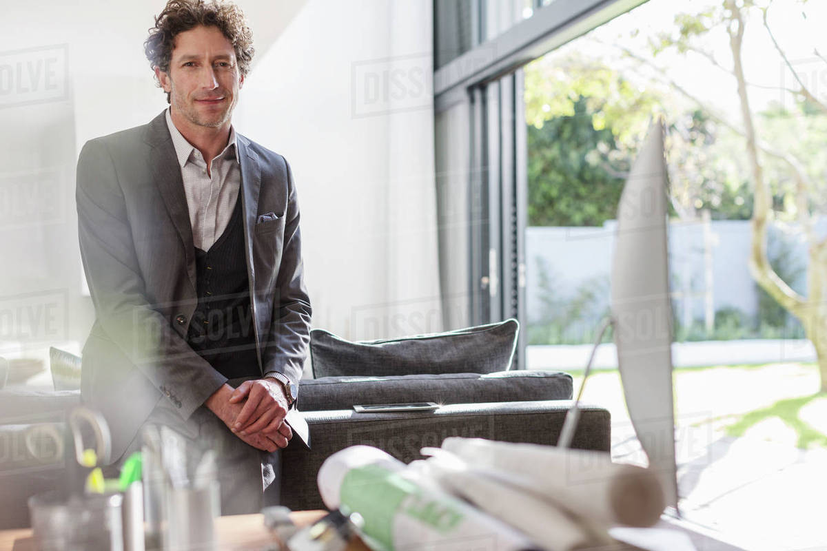 Portrait confident male architect in home office Royalty-free stock photo