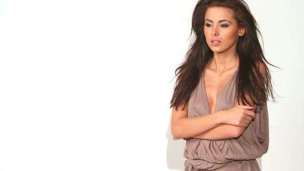 Unhappy Sexy Woman Posing On White Background Royalty Free Stock Video Unhappy Sexy Woman Posing On White Background Royalty Free Stock Video