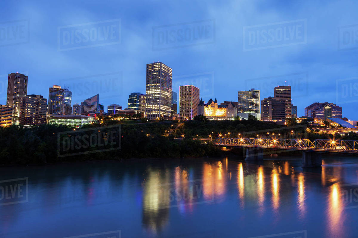 Canada, Alberta, Edmonton, Waterfront at dusk Stock Photo Dissolve