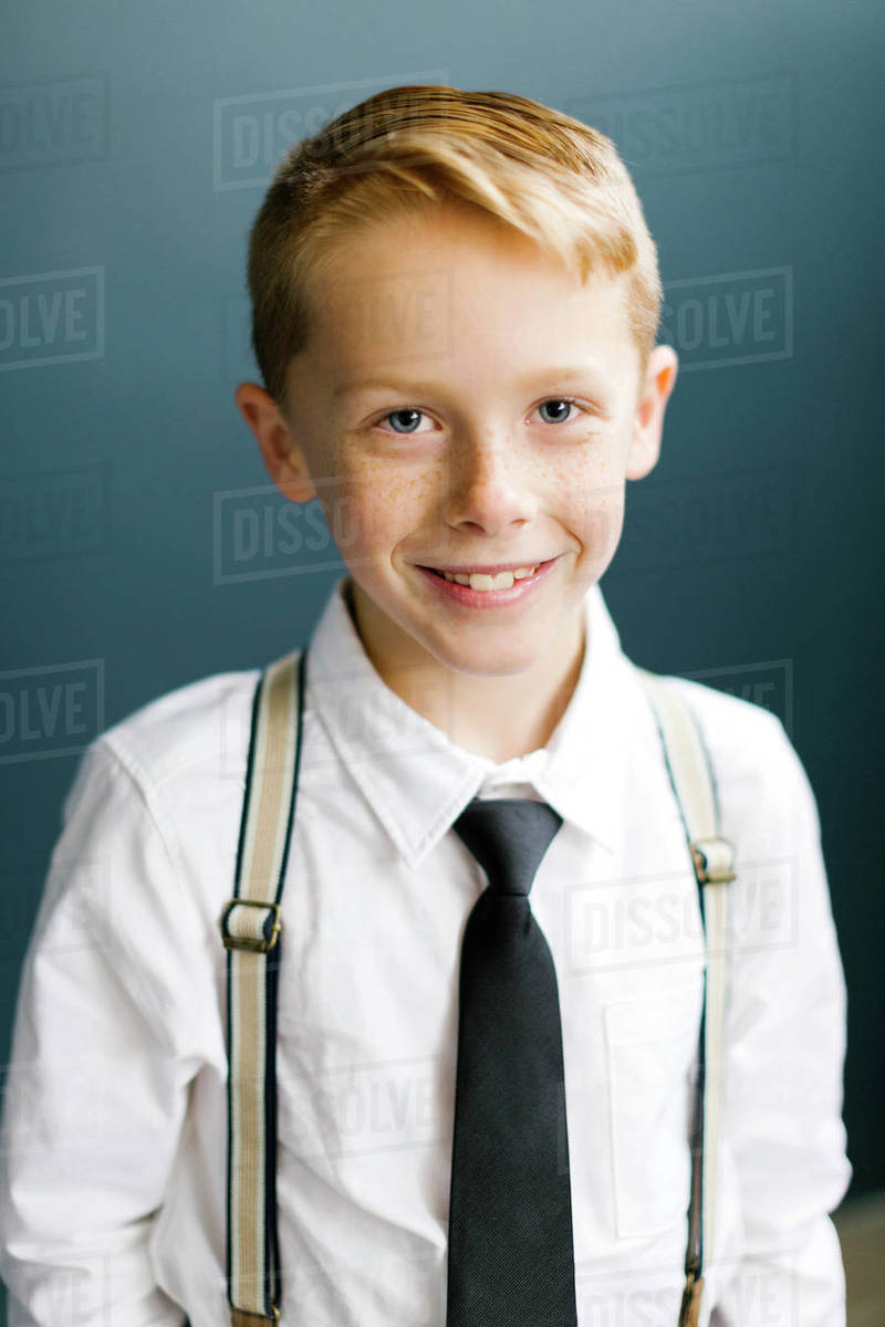 Portrait of smiling boy wearing tie Stock Photo Dissolve