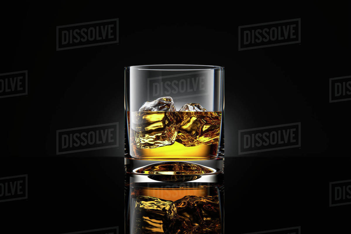 Whiskey with ice Stock Photo Dissolve