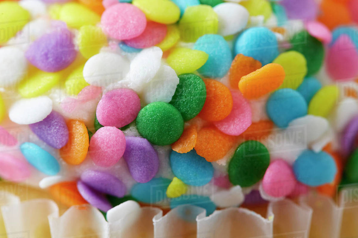 Close up of sprinkles on cupcake - Royalty-free Stock Photo | Dissolve