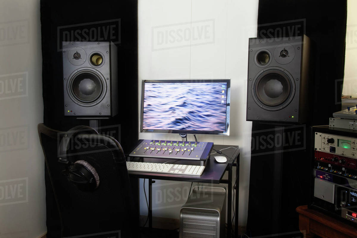 Mixing console and speakers in recording studio Stock Photo Dissolve