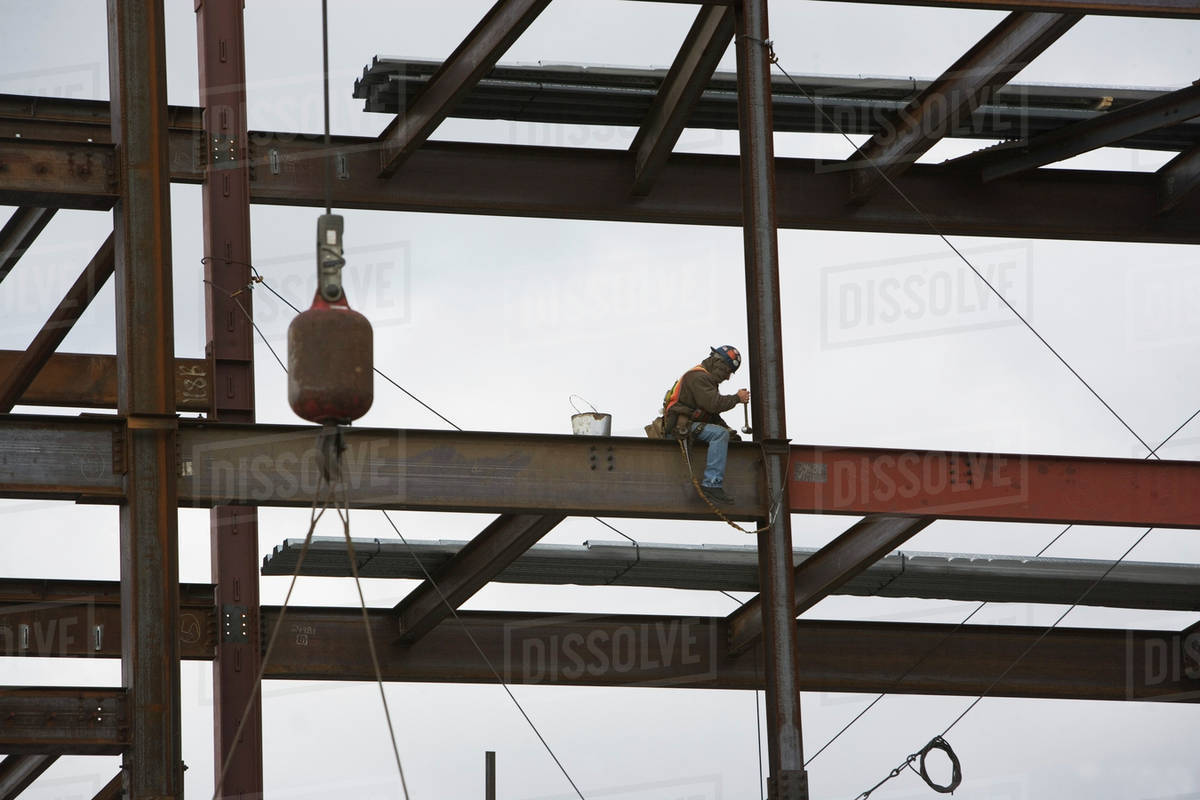 USA, New York State, New York City, Construction worker on crane