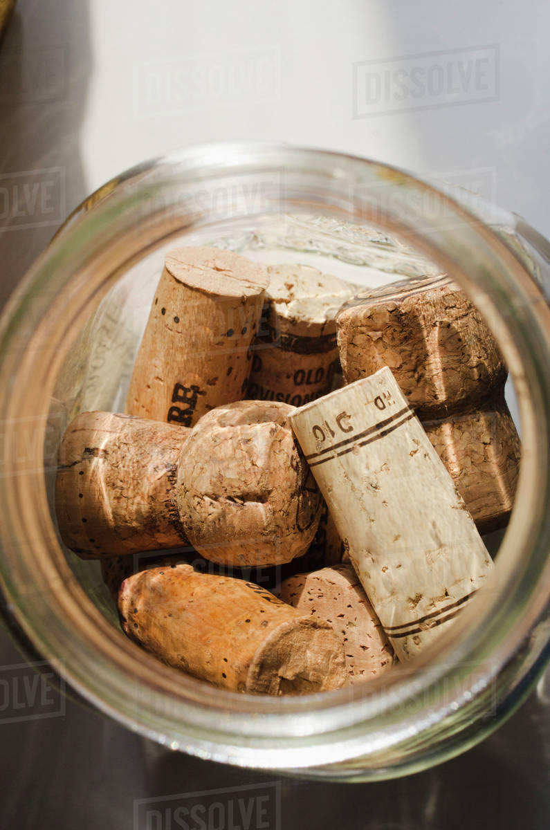 Wine corks in glass jar Stock Photo Dissolve