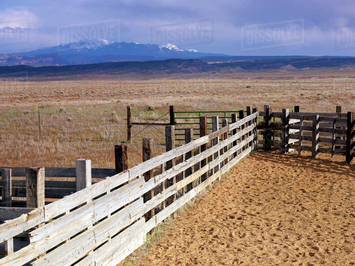 USA, Utah, Wooden fence on ranch Stock Photo Dissolve