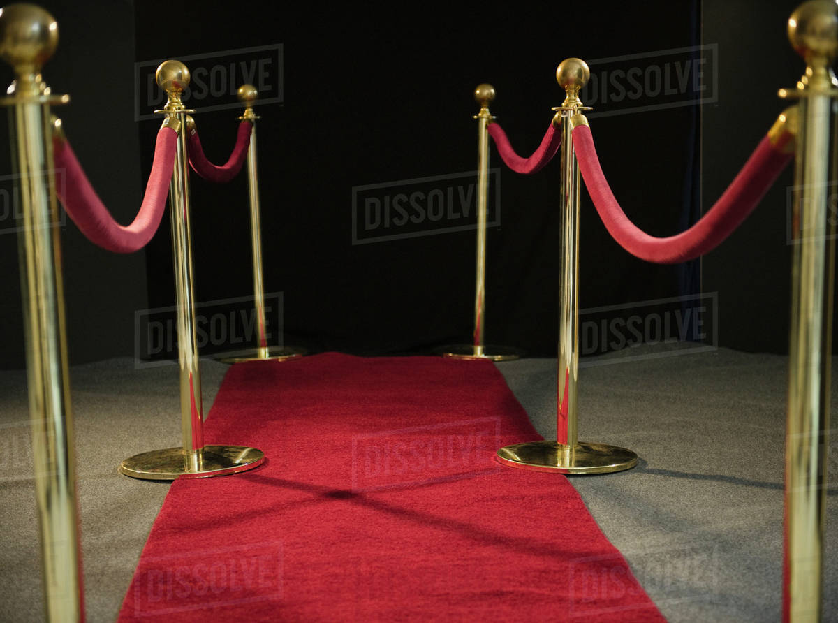 Rope barriers at red carpet event Stock Photo Dissolve