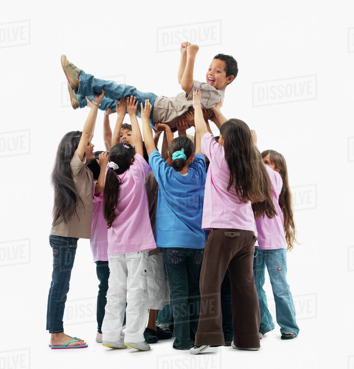 Children lifting one child Stock Photo Dissolve