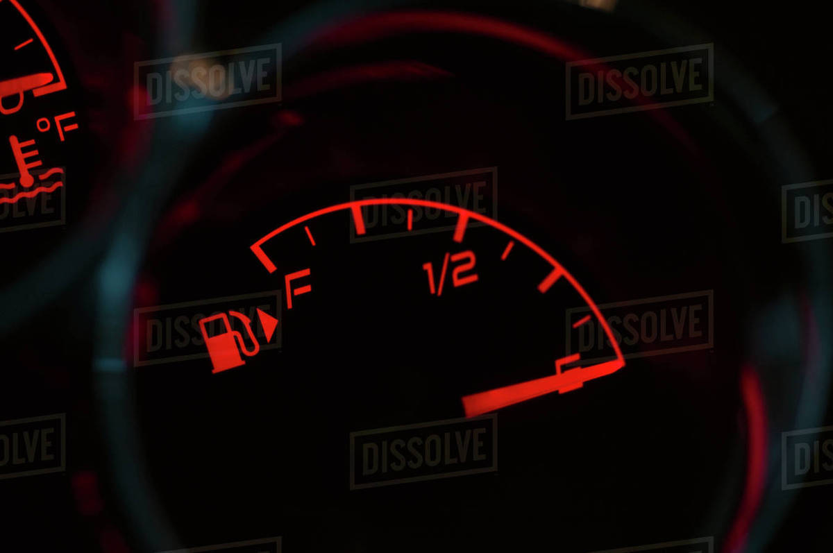 Gas gauge in a car Stock Photo Dissolve
