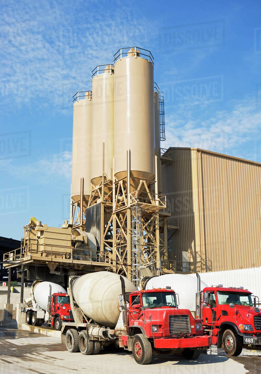 Cement trucks parked at cement plant Stock Photo Dissolve