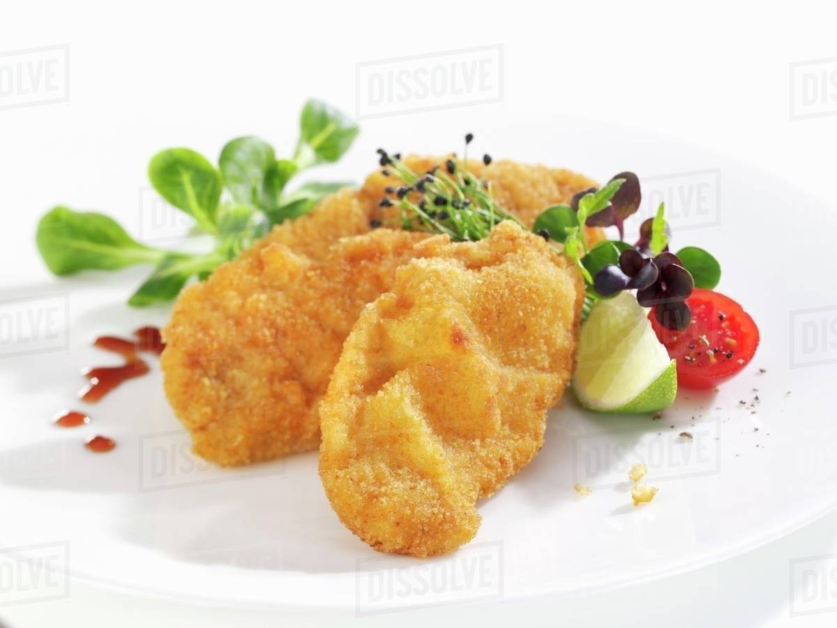 Wiener schnitzel (breaded veal escalope) with salad garnish Stock