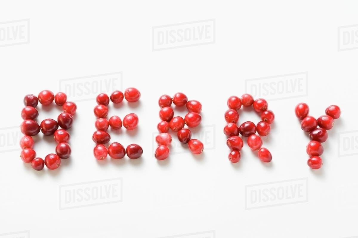 The word BERRY written in cranberries Stock Photo Dissolve
