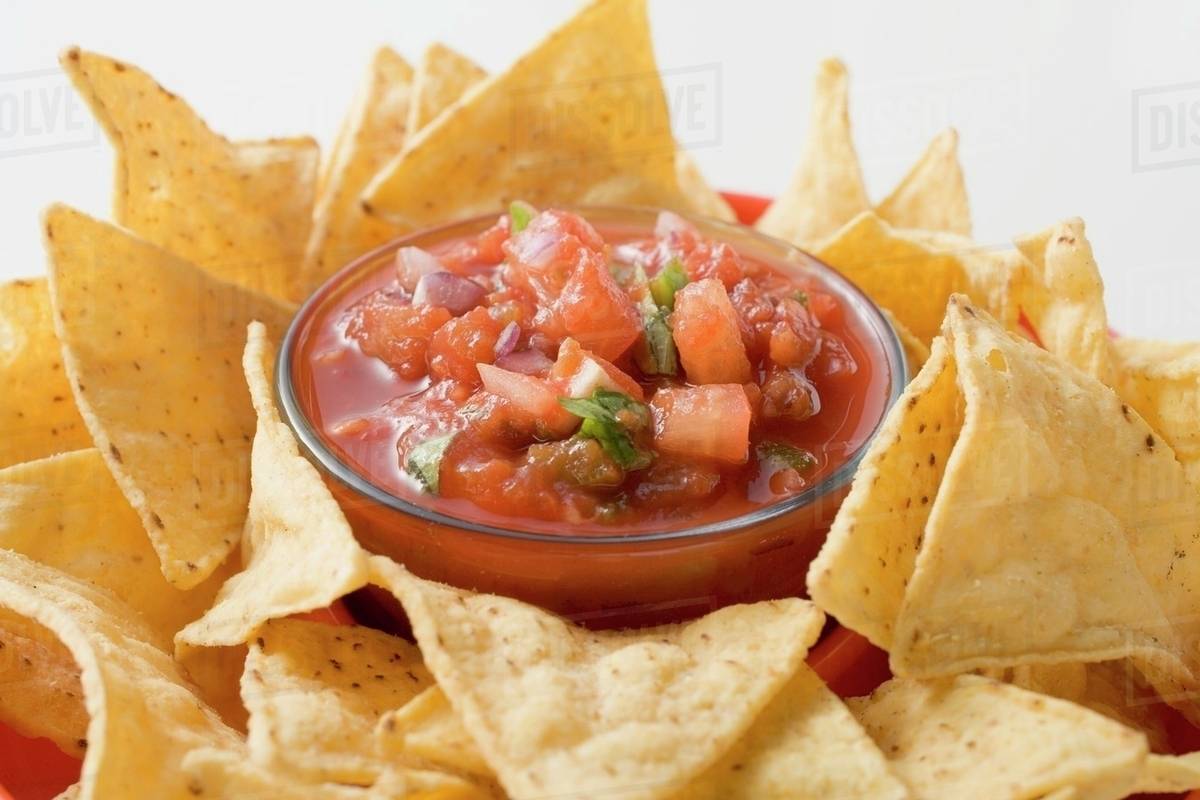 Salsa with nachos - Stock Photo - Dissolve