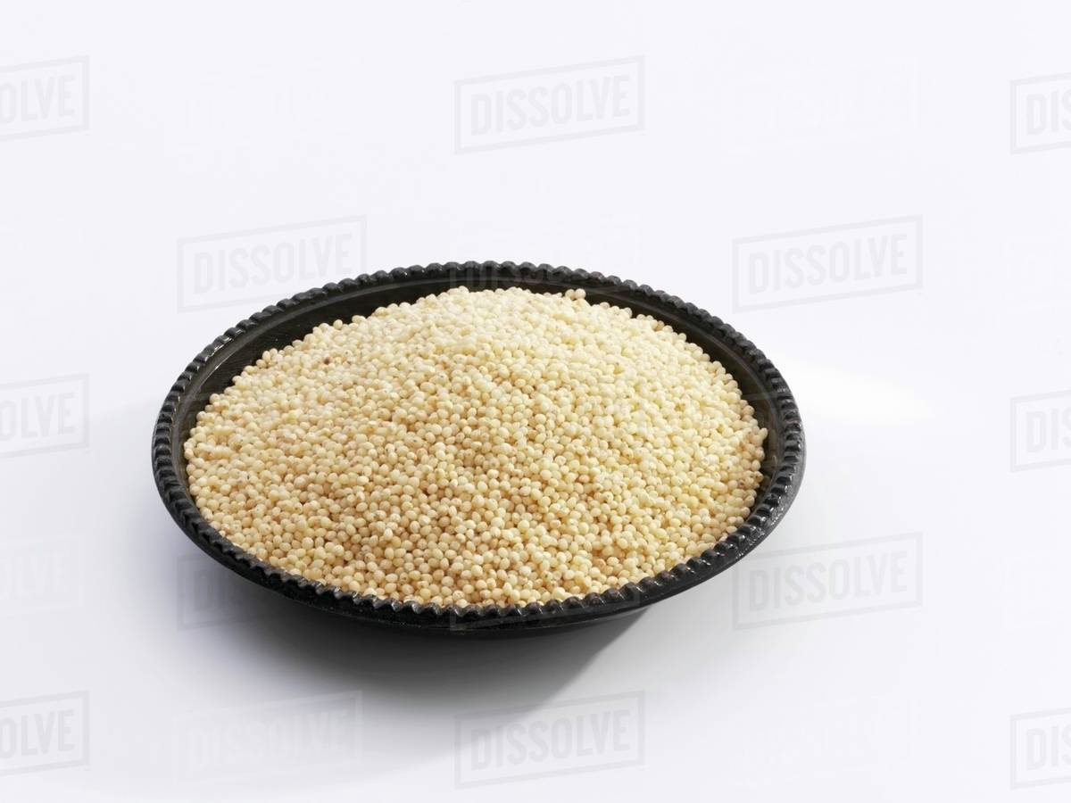 Millet in a dish Stock Photo Dissolve