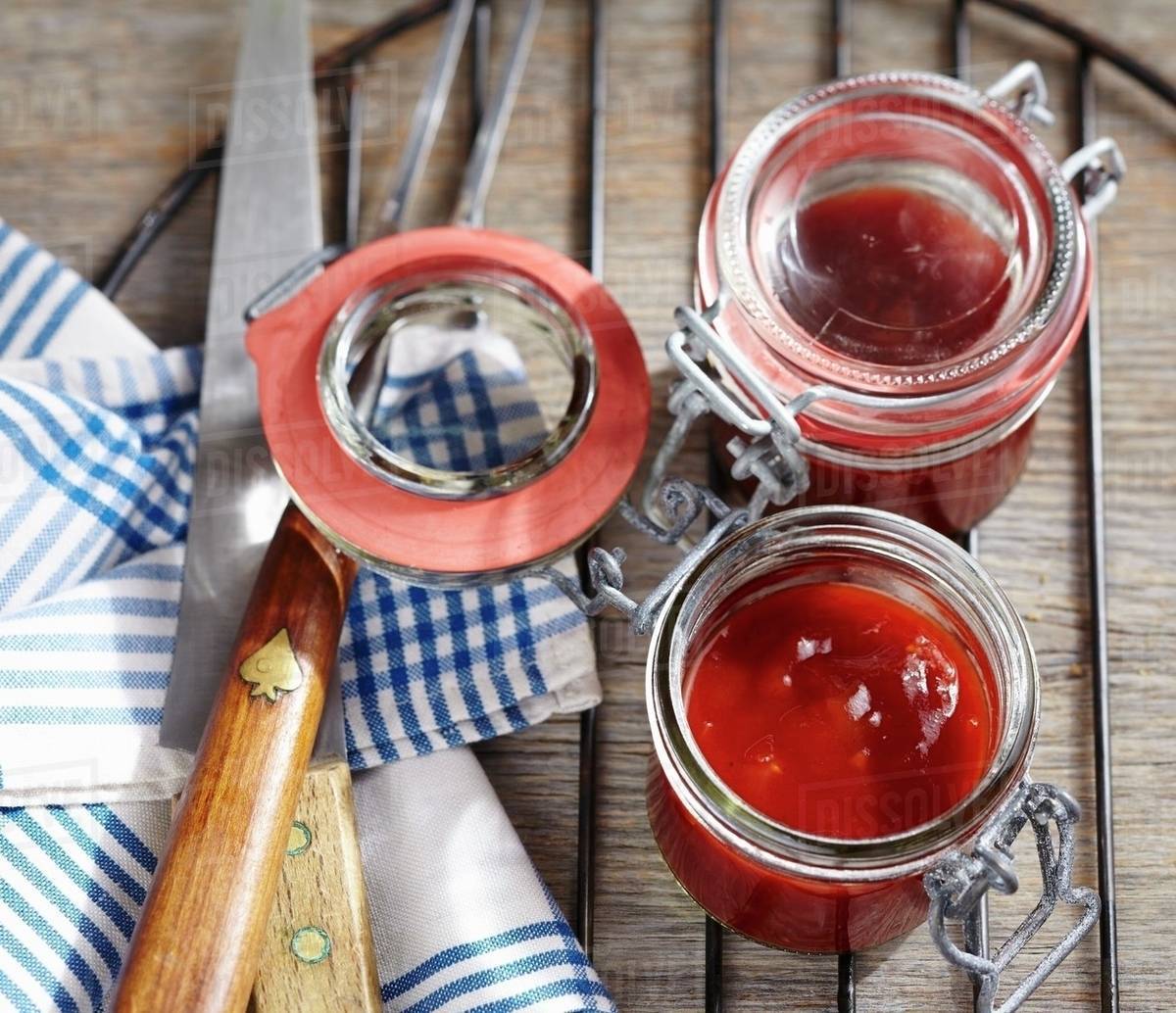 Homemade barbecue sauce in preserving jars Stock Photo Dissolve