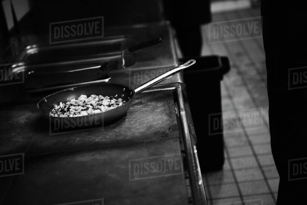 A pan on a hot stove Stock Photo Dissolve