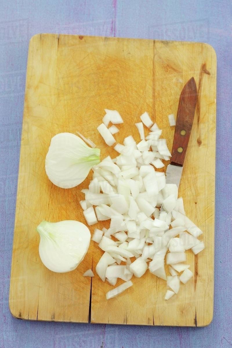 Onions, halved and chopped Stock Photo Dissolve