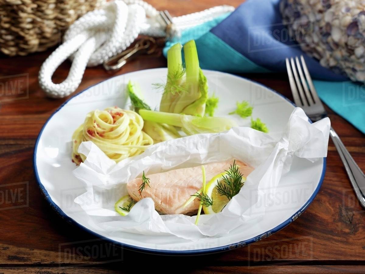 Salmon baked in parchment paper with tagliatelle and fennel Stock