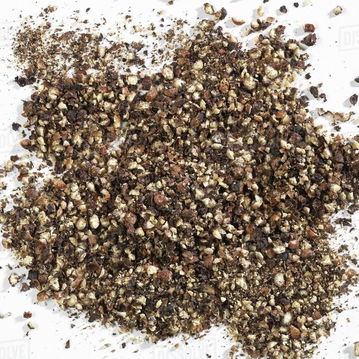Roughly ground peppercorns Stock Photo Dissolve