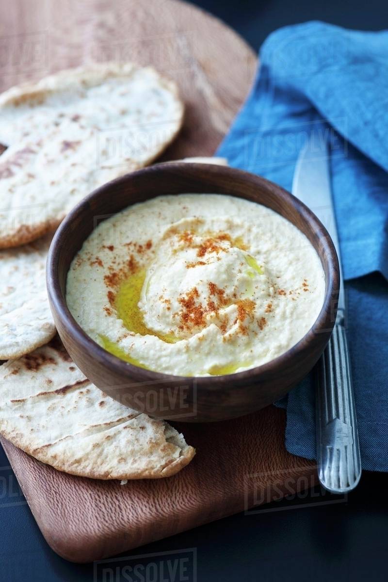Hummus with pita bread Stock Photo Dissolve