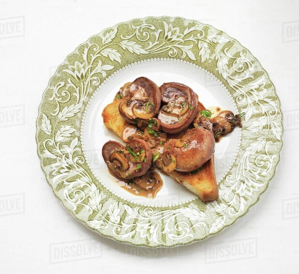 Kidneys and mushrooms on toast Stock Photo Dissolve