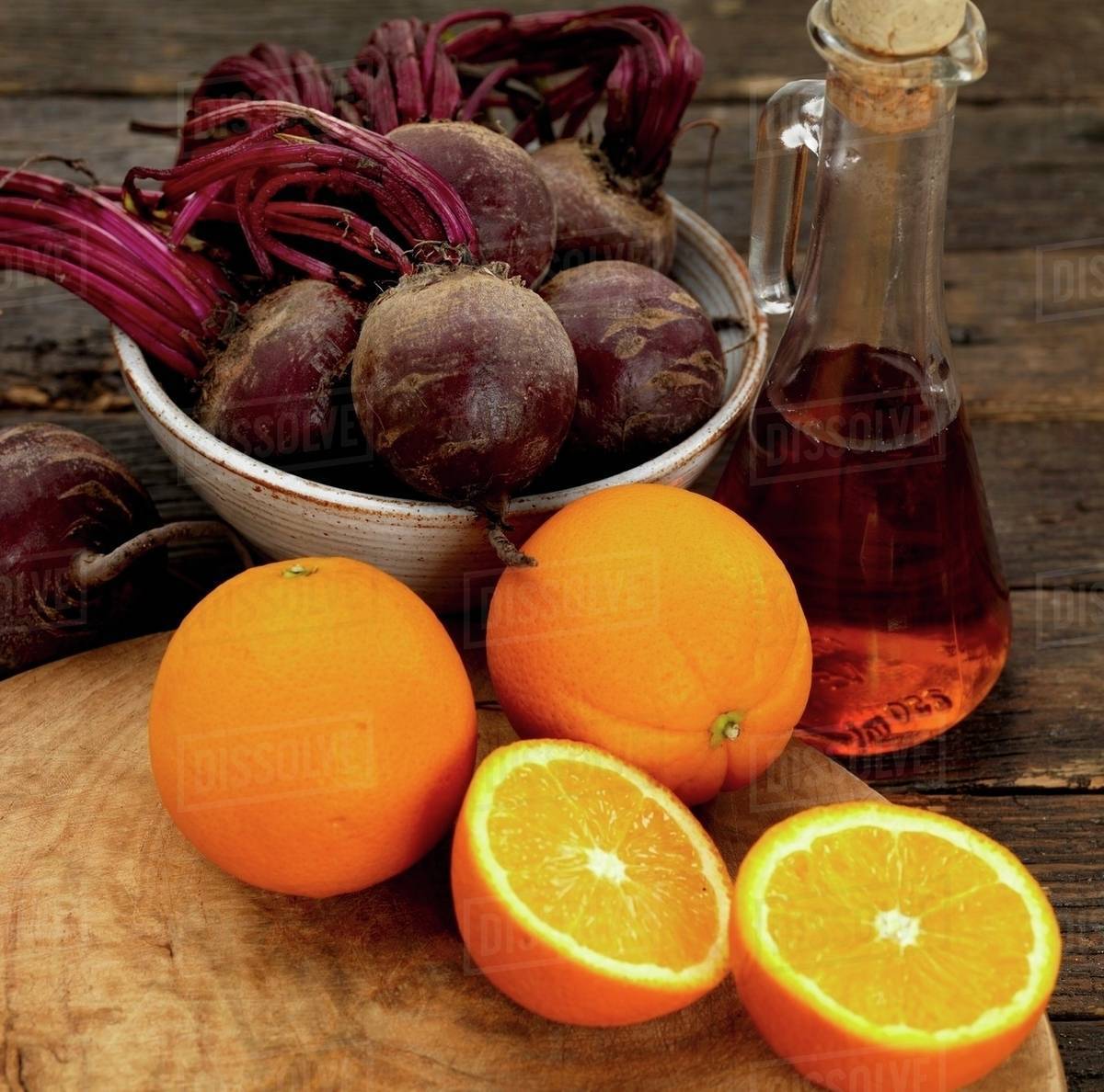 Beetroots, oranges with red wine vinegar Stock Photo Dissolve