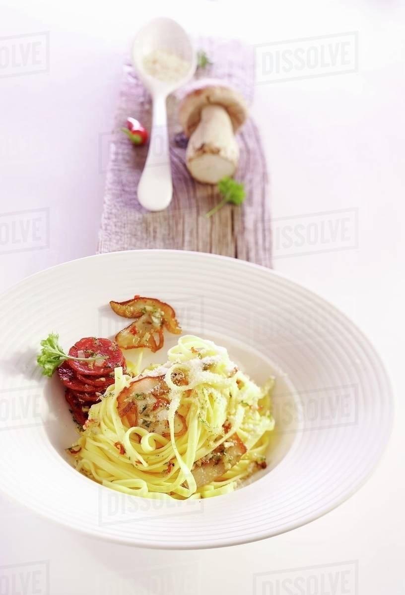 Fettuccine with porcini mushrooms Stock Photo Dissolve