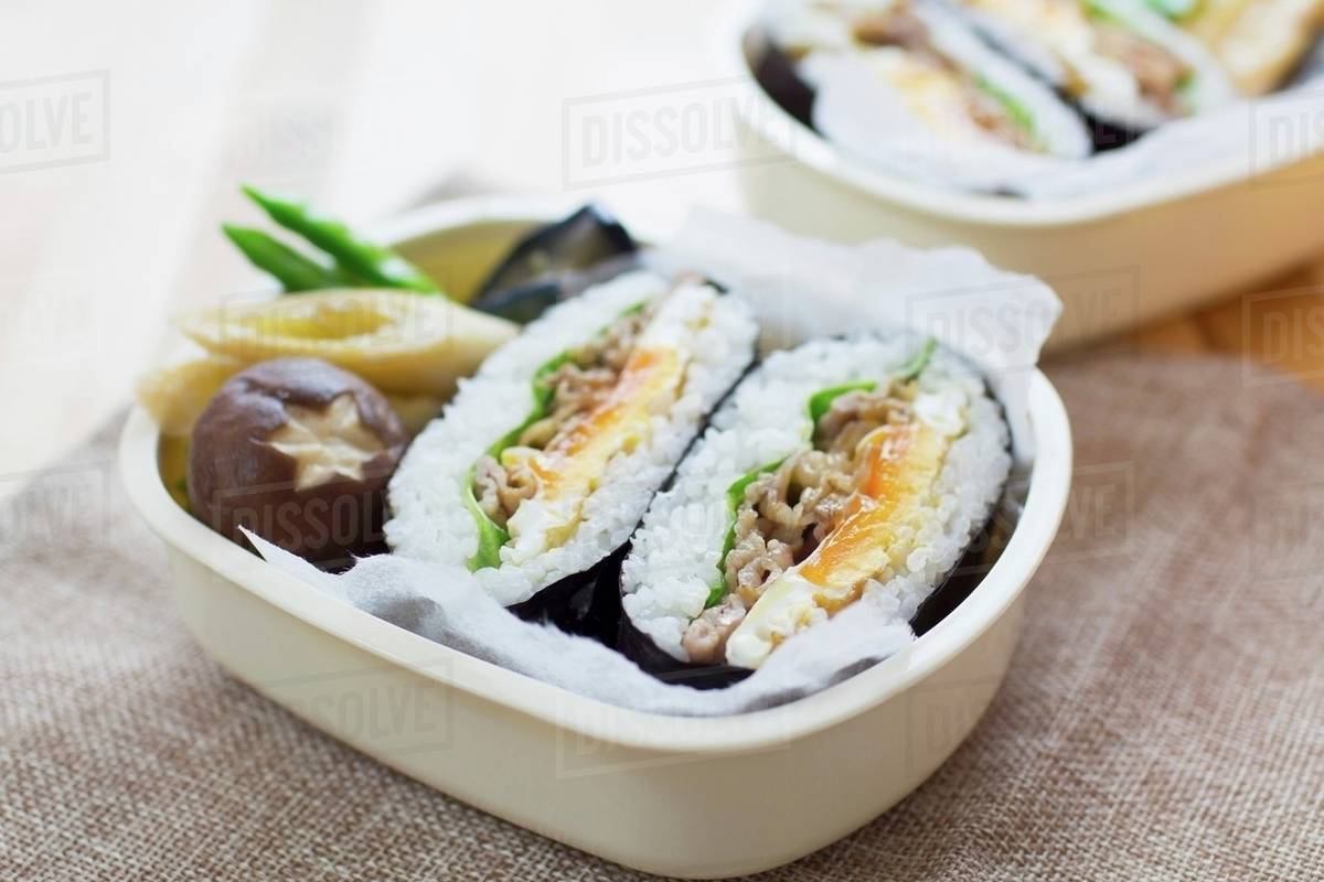 Rice cake with sliced beef - Stock Photo - Dissolve