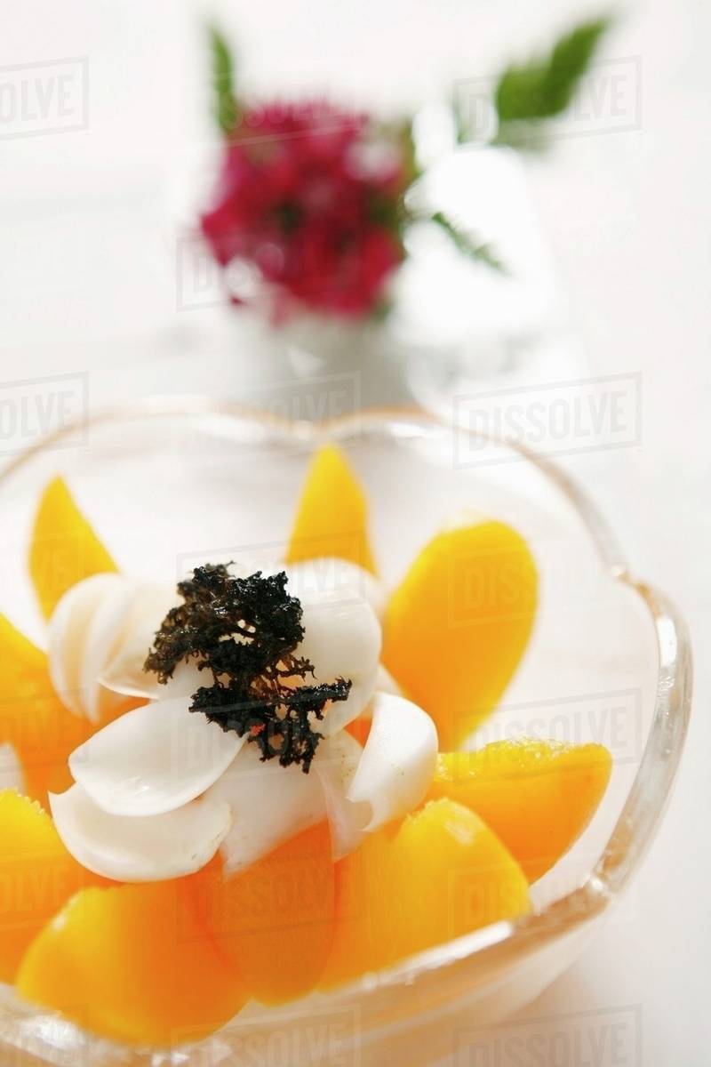 Peach fruit cup Stock Photo Dissolve