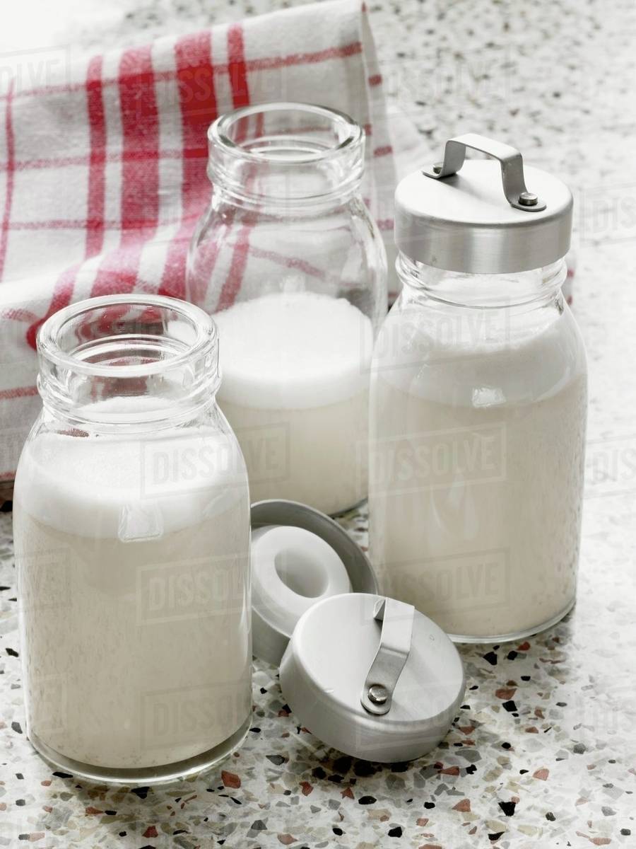 Bottles of almond milk Stock Photo Dissolve