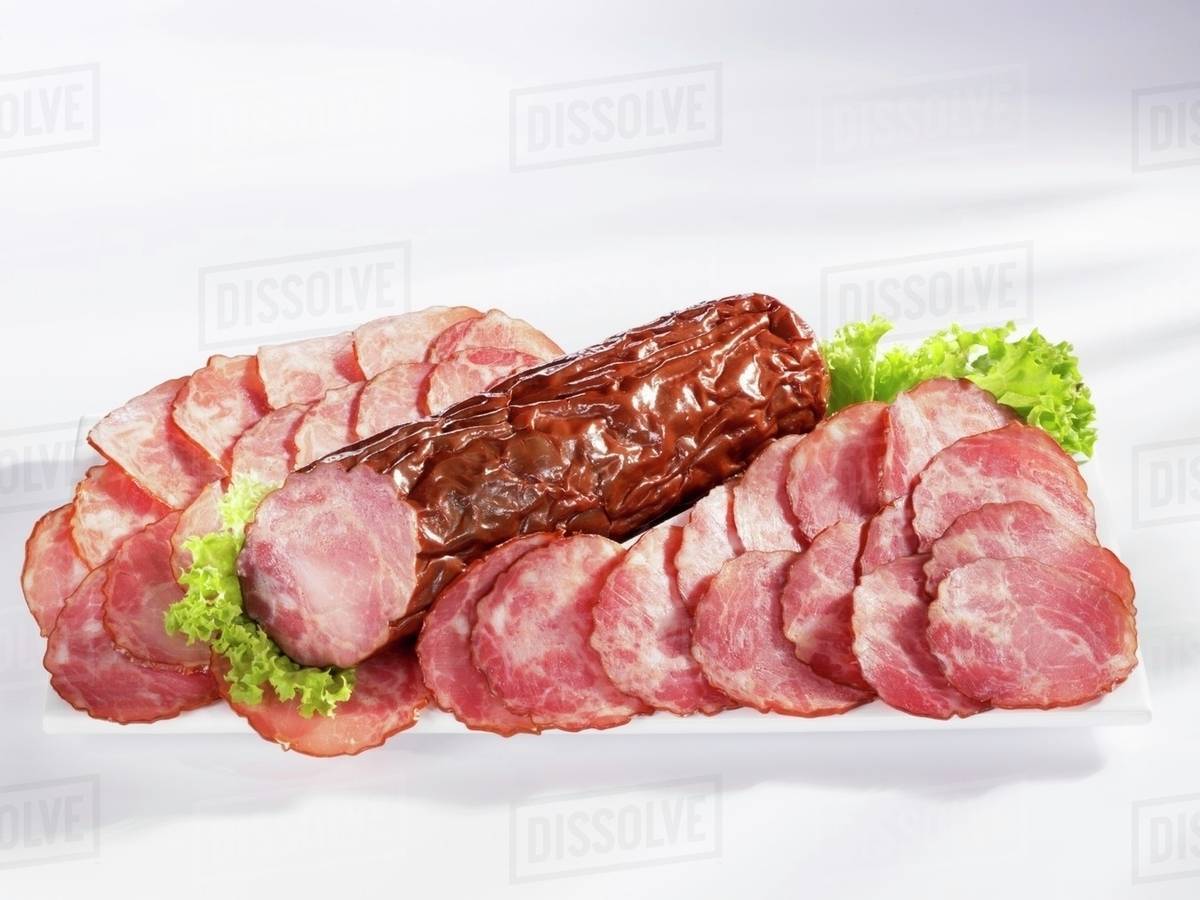 Krakauer sausage, sliced Stock Photo Dissolve