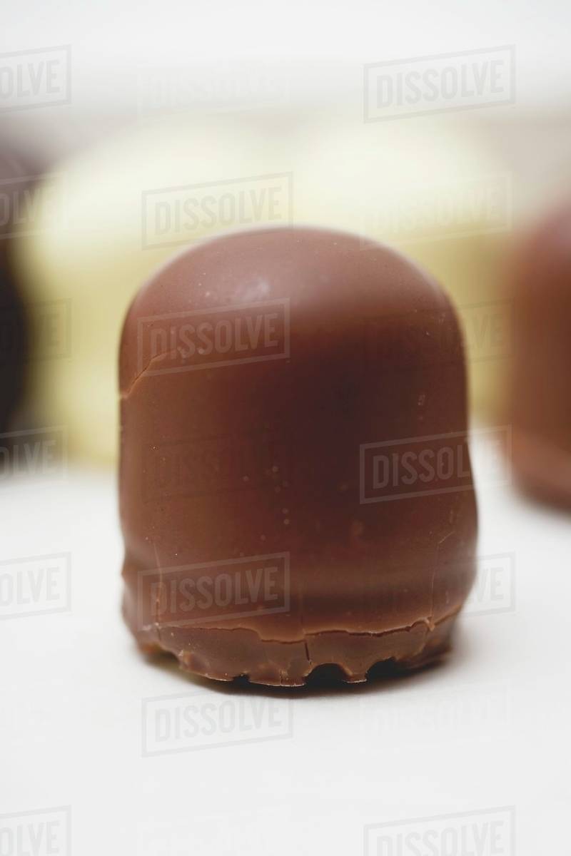 A miniDickmann (chocolatecovered marshmallow on wafer base) Stock