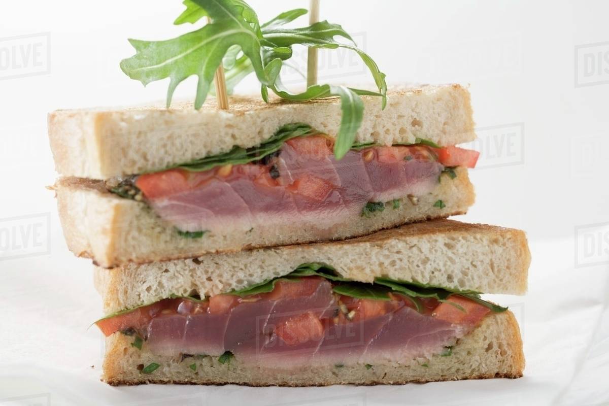 Tuna sandwiches with rocket Stock Photo Dissolve