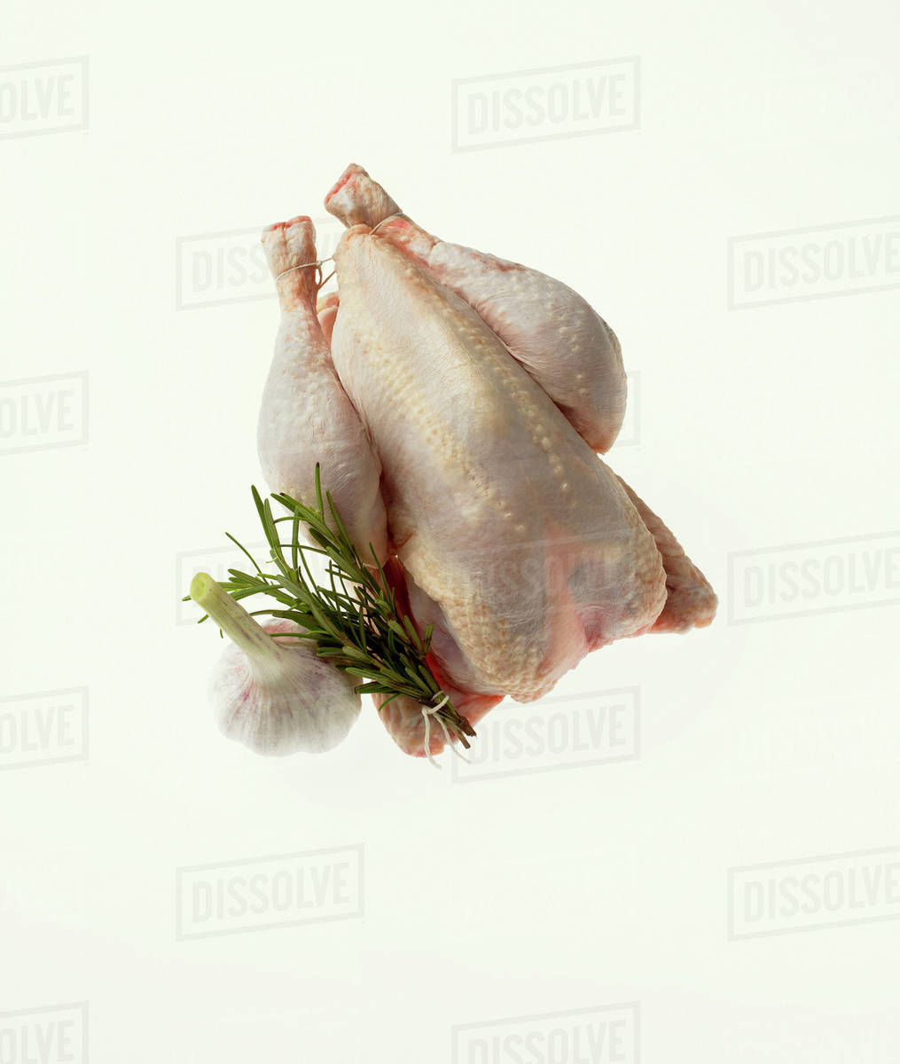 A whole, plucked, French chicken Stock Photo Dissolve
