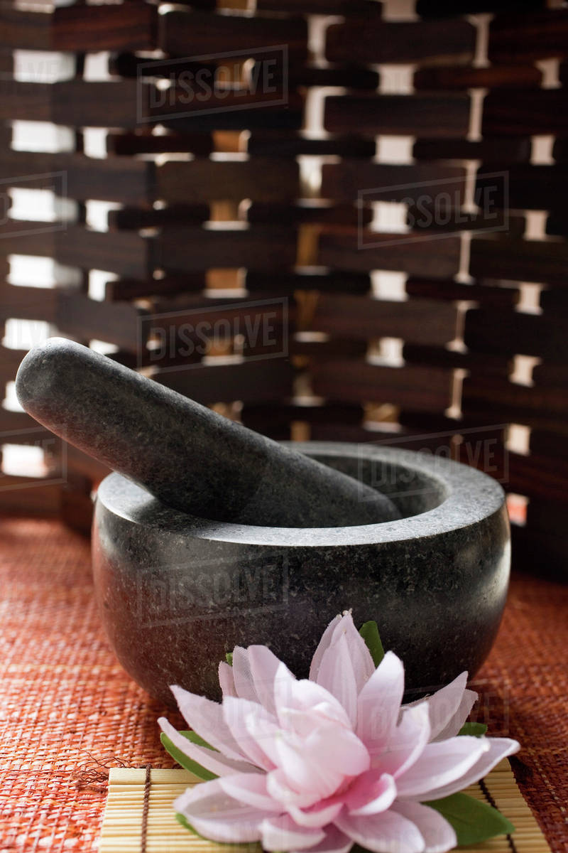 Mortar with pestle (Asia) Stock Photo Dissolve