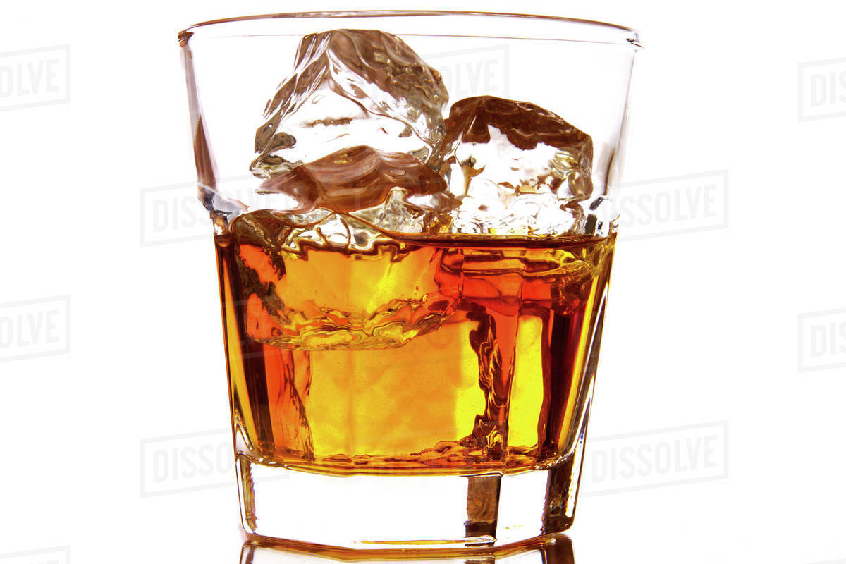 Whiskey on the rocks Stock Photo Dissolve