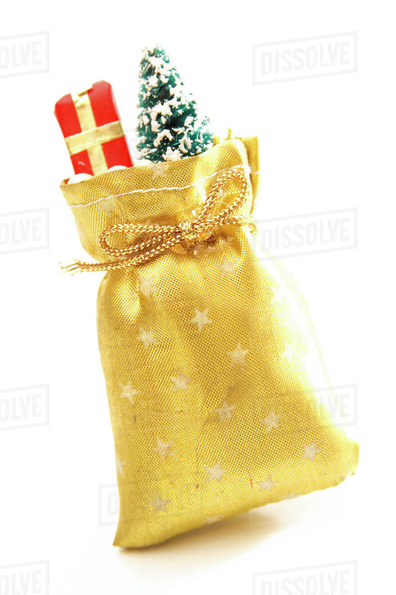 Golden bag with presents Stock Photo Dissolve