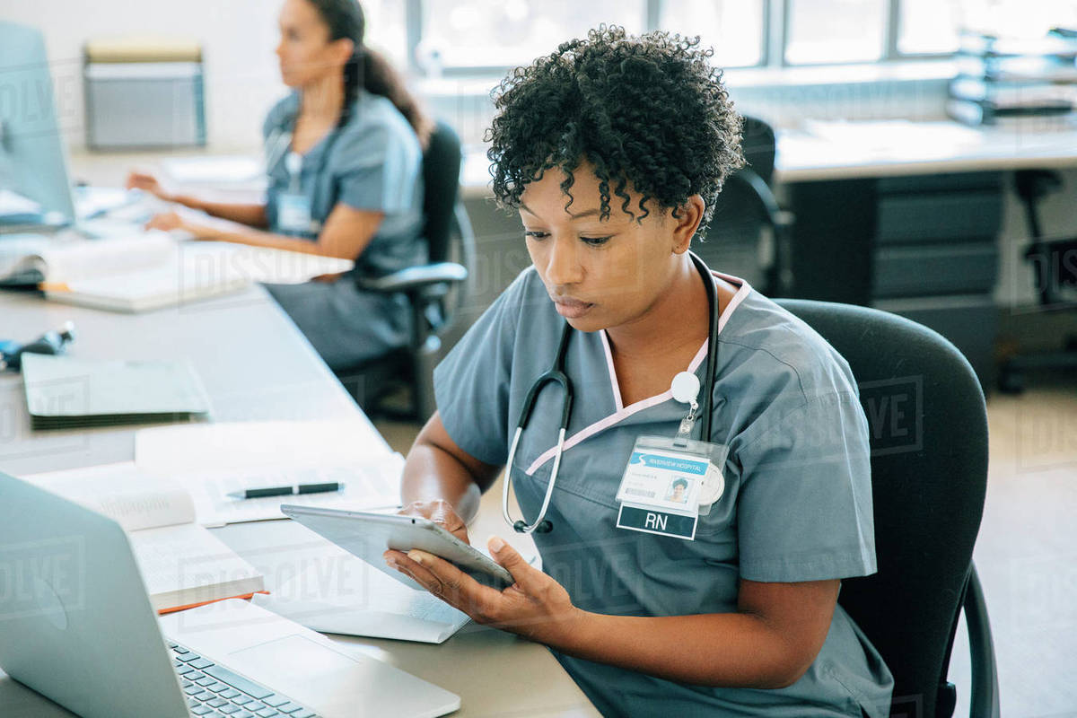 Nurse using digital tablet Royalty-free stock photo