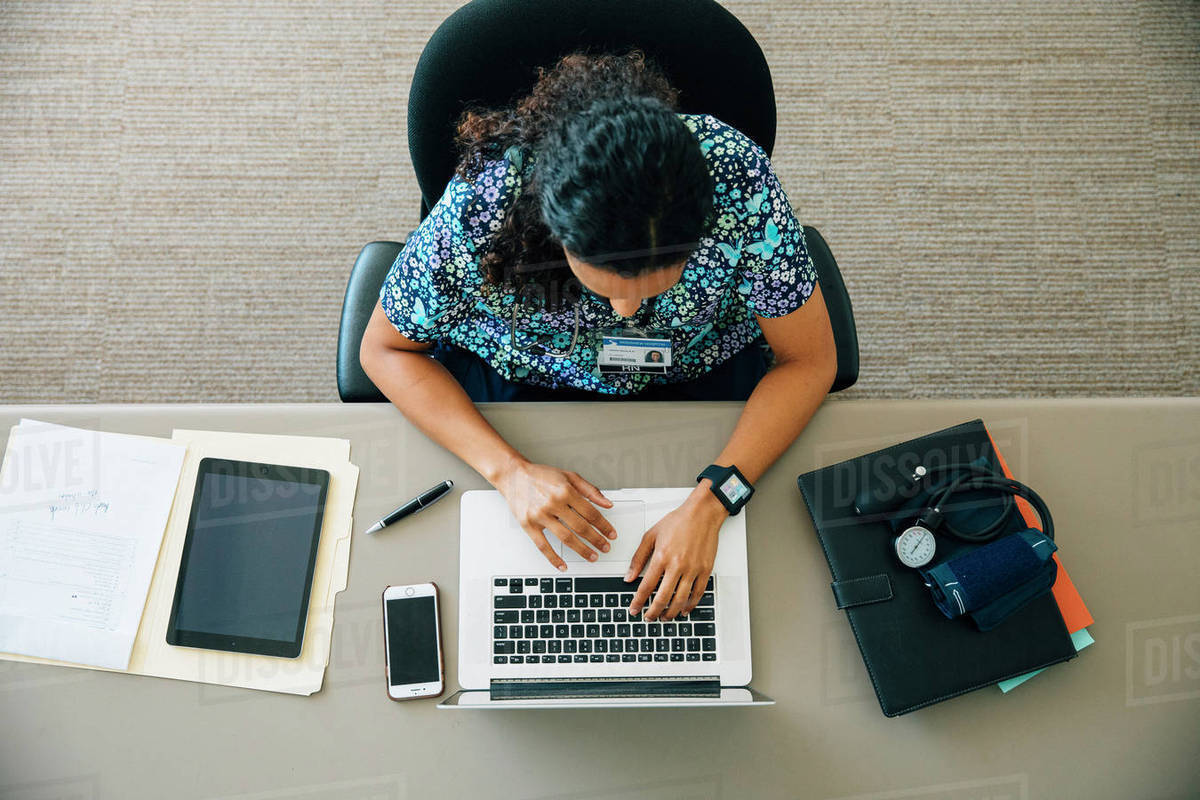 High angle view of nurse using laptop Royalty-free stock photo