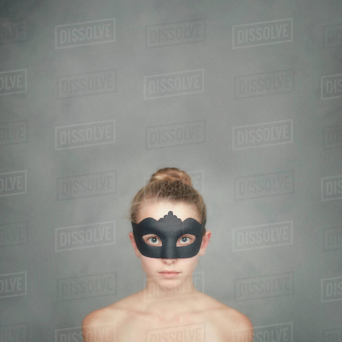 Caucasian girl wearing black mask Stock Photo Dissolve
